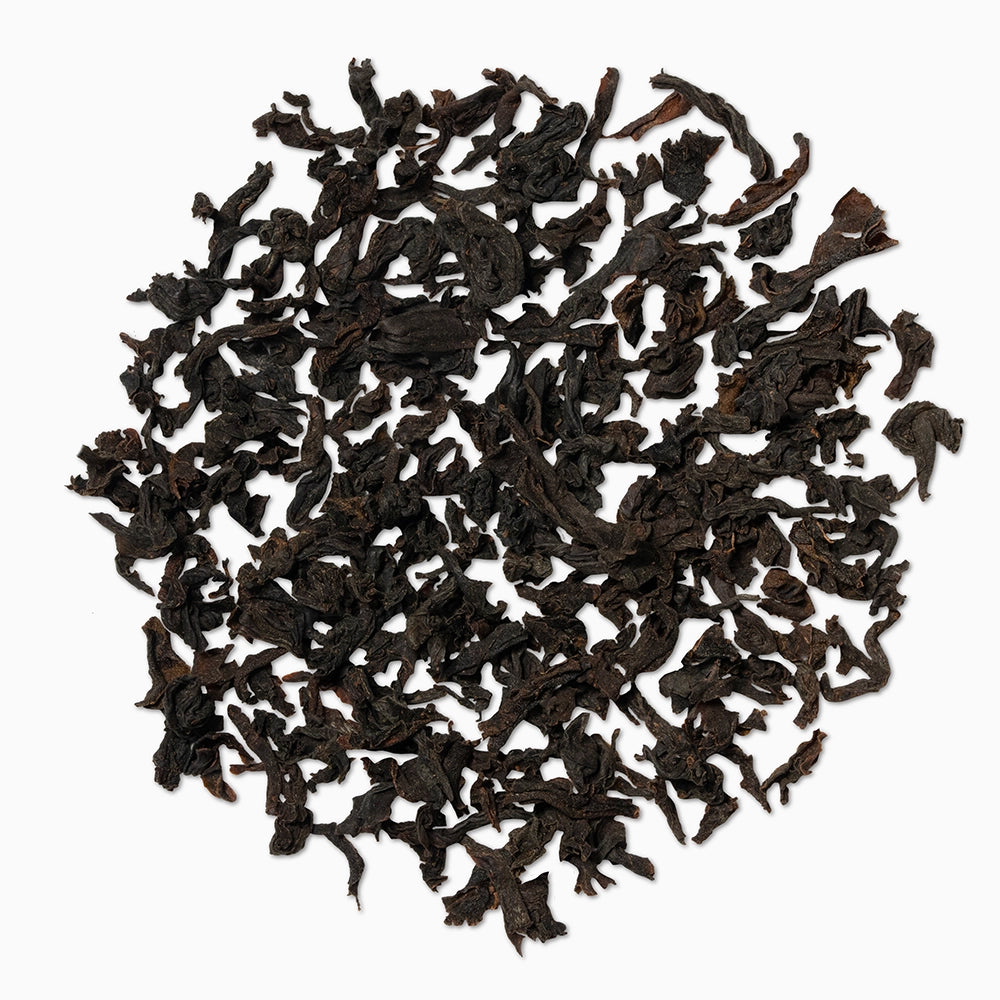 Close-up of lockhart noir dry leaves — showing rich texture and granules.